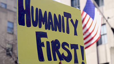 Humanity First! by Gayle Sheridan at Sister March NYC