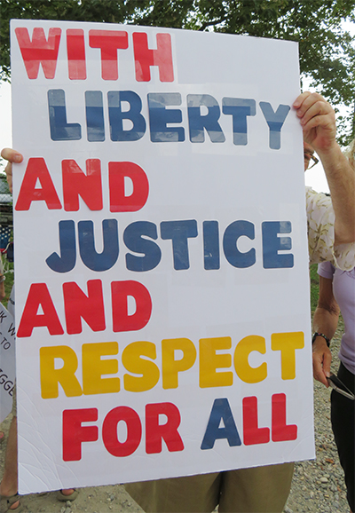 liberty, justice, respect sign at Trump protest