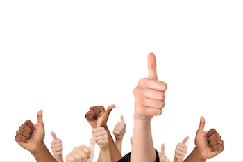 several hands showing thumbs up