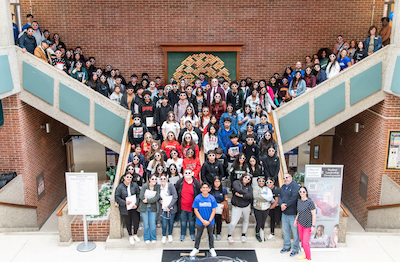 image of dozens of high school students on the stairs in the Babylon Student Center for the Take a Look at Teaching program